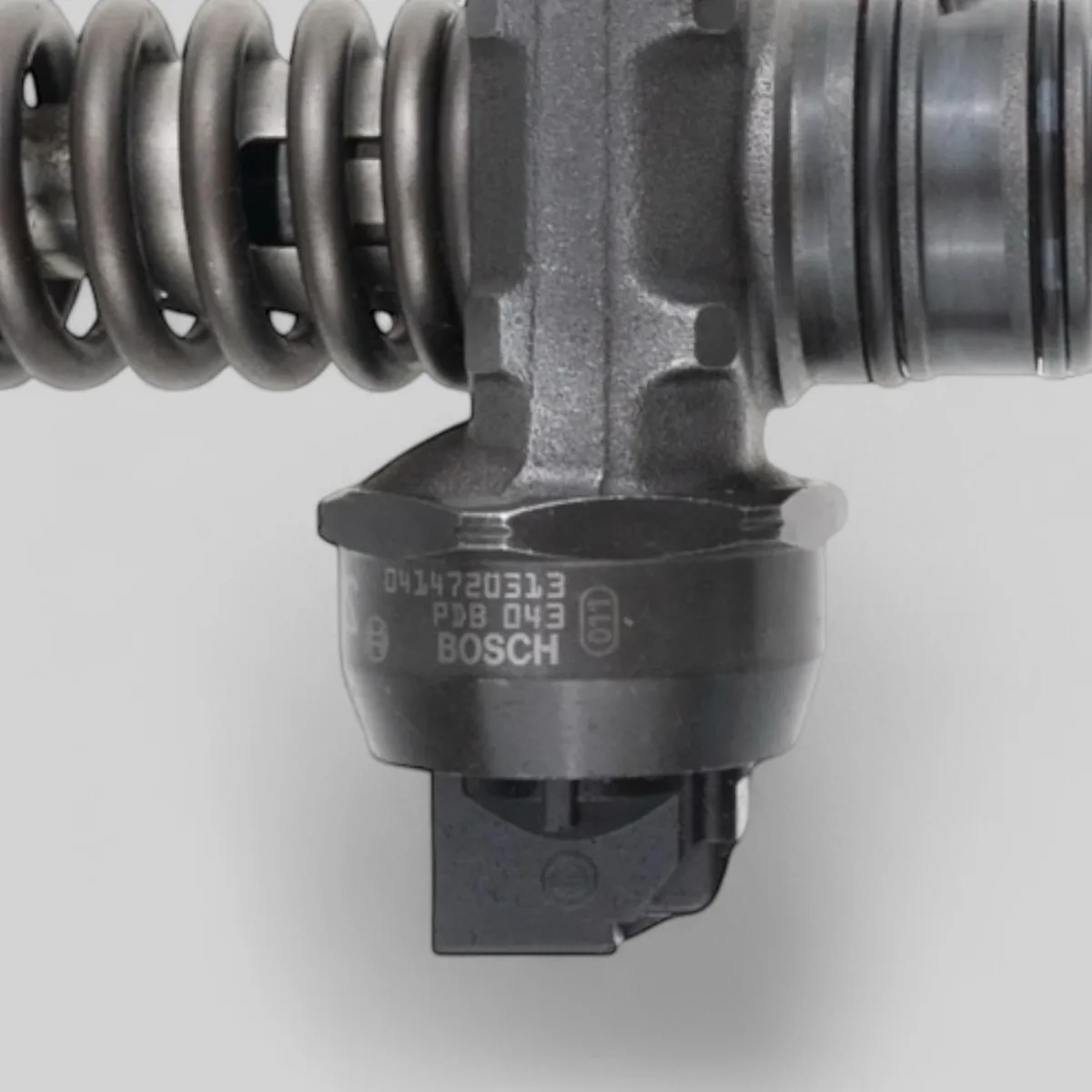 Close-up of Bosch 0414720313 part-number markings 0414720313 with data-matrix code