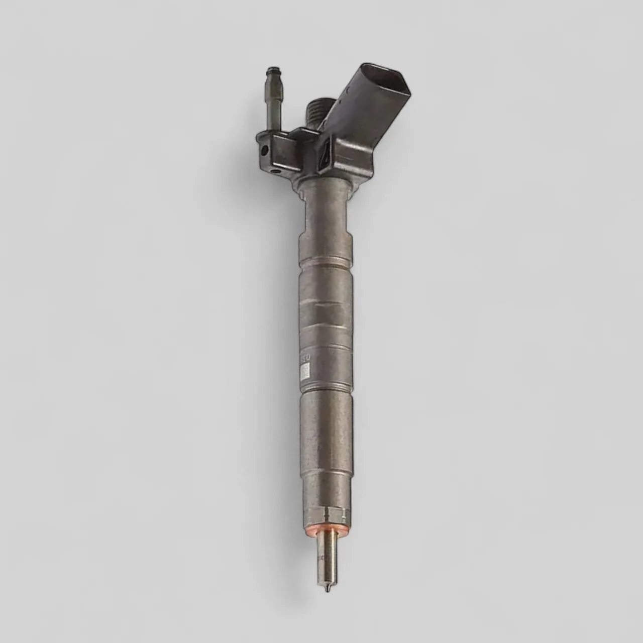Remanufactured Bosch 0445116001 diesel injector standing view