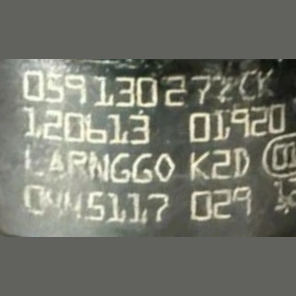 Bosch 0445117029 diesel injector part-number close-up showing 0445117 029 and Audi OE 059130277CK