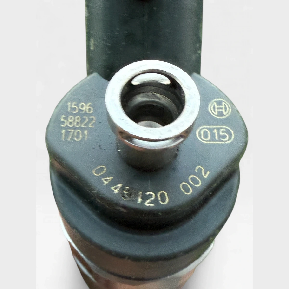 Bosch 0445120002 diesel injector part-number close-up with Bosch marking
