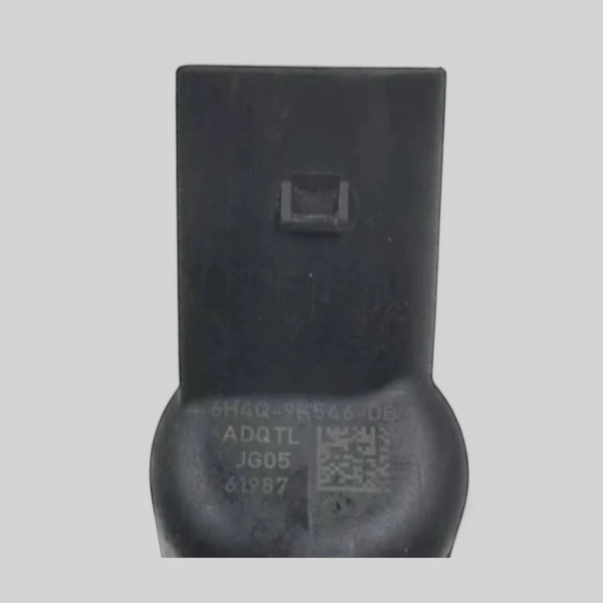 Continental/VDO A2C59513597 diesel injector part-number close-up (6H4Q-9K546-DB / ADQTL / JG05 / 61987)