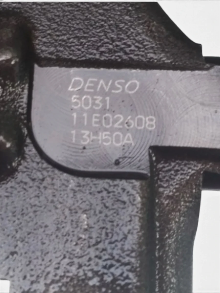 Denso DCRI107850 part-number close-up showing etched DENSO 5031 / 11E02608 / 13H50A