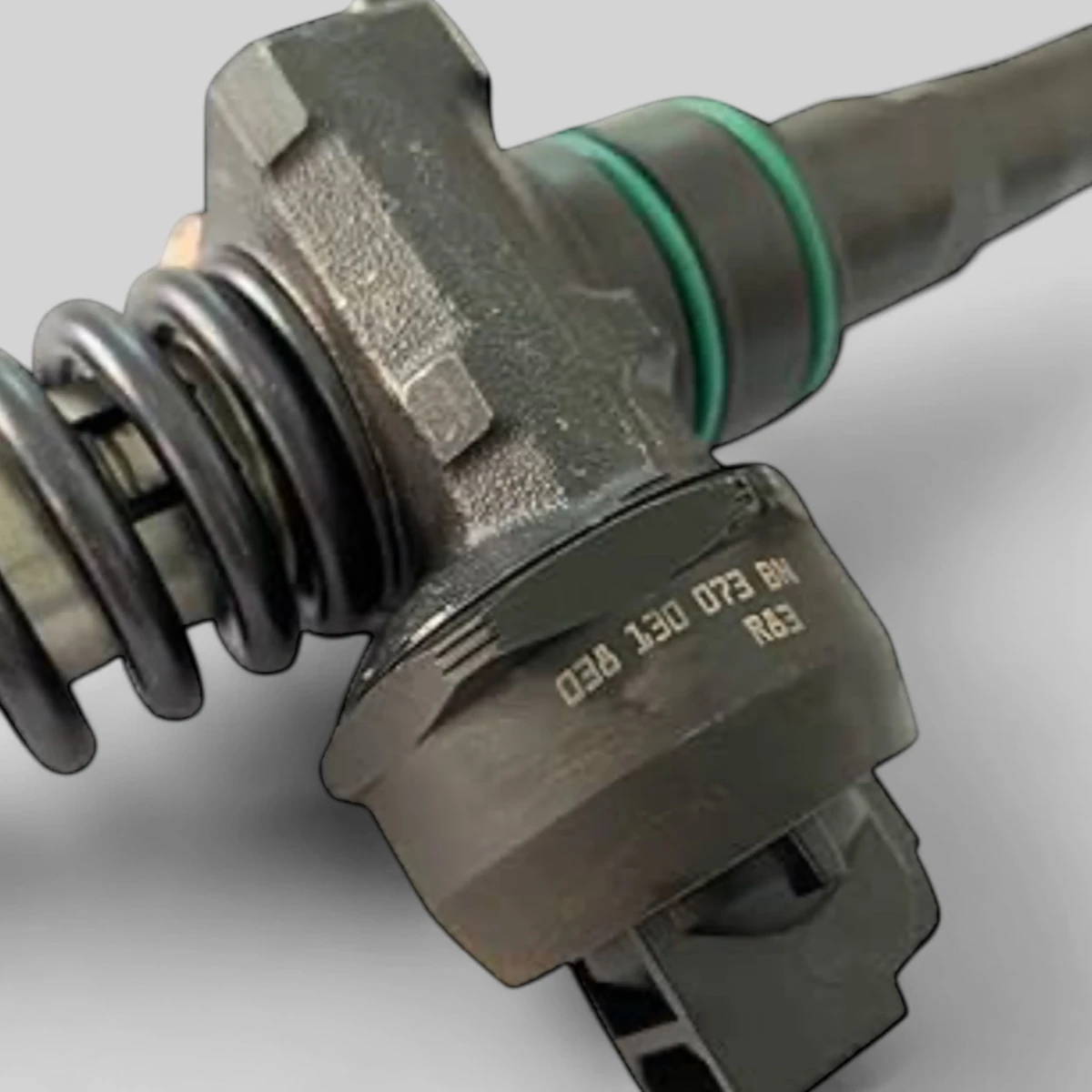Remanufactured Bosch 038130073BN diesel injector — part number close-up