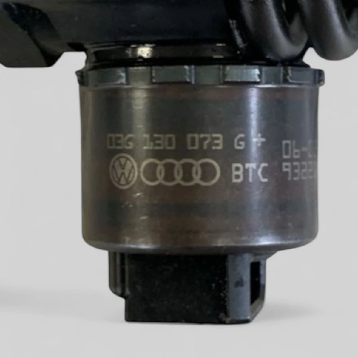 Remanufactured Bosch 03G130073G diesel injector — part number close-up