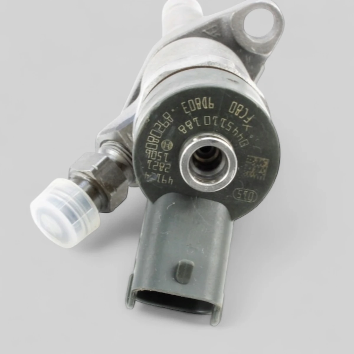 Bosch 0445110188 diesel injector laser etching close-up showing Bosch part number