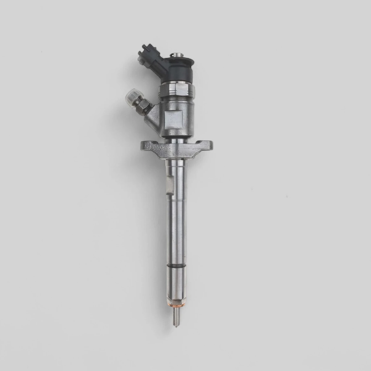 Remanufactured Bosch 0445110311 diesel injector standing side view