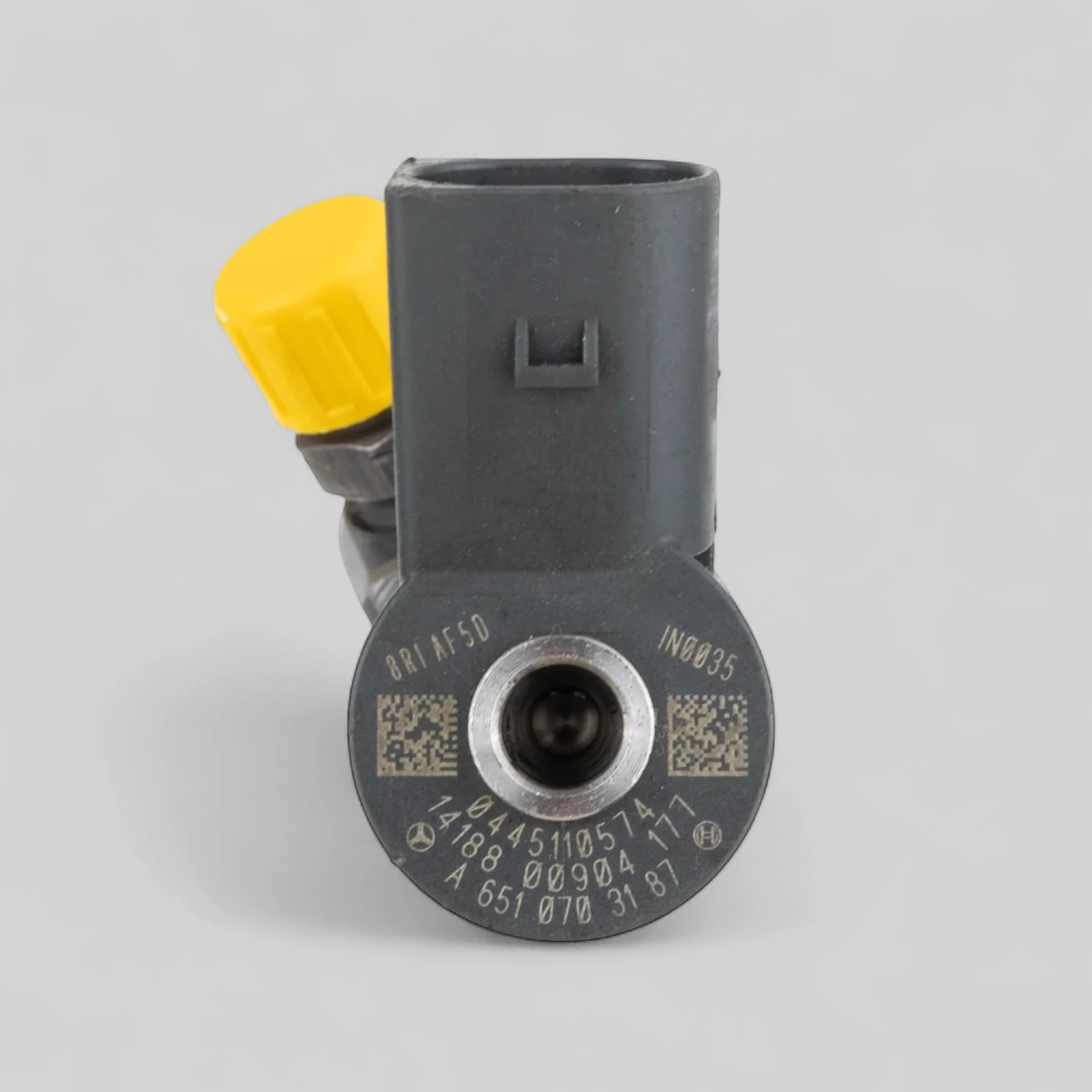 Bosch 0445110574 diesel injector close-up showing BOSCH logo, part number 0445110574 and Mercedes OE A6510703187