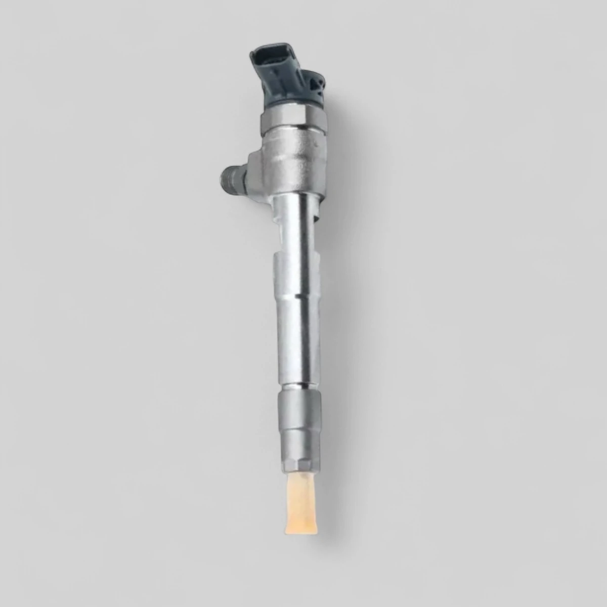 Remanufactured Bosch 0445110800 diesel injector — standing side view