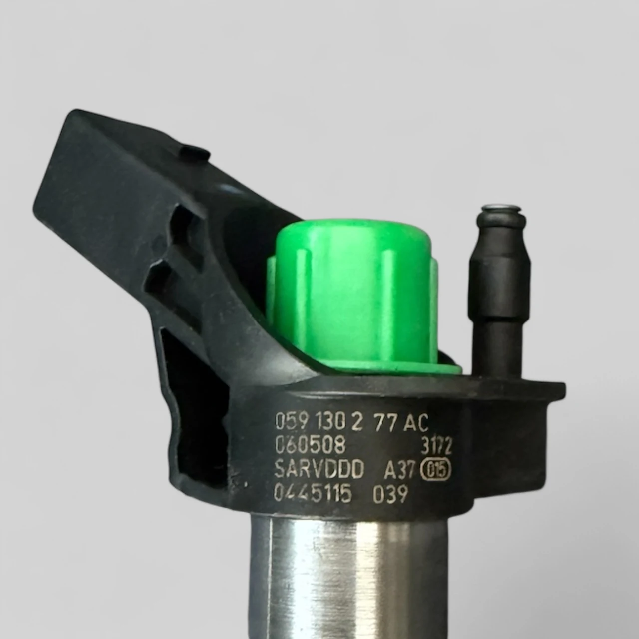 Close-up of Bosch 0445115039 part number marking with Audi OE 059130277AC