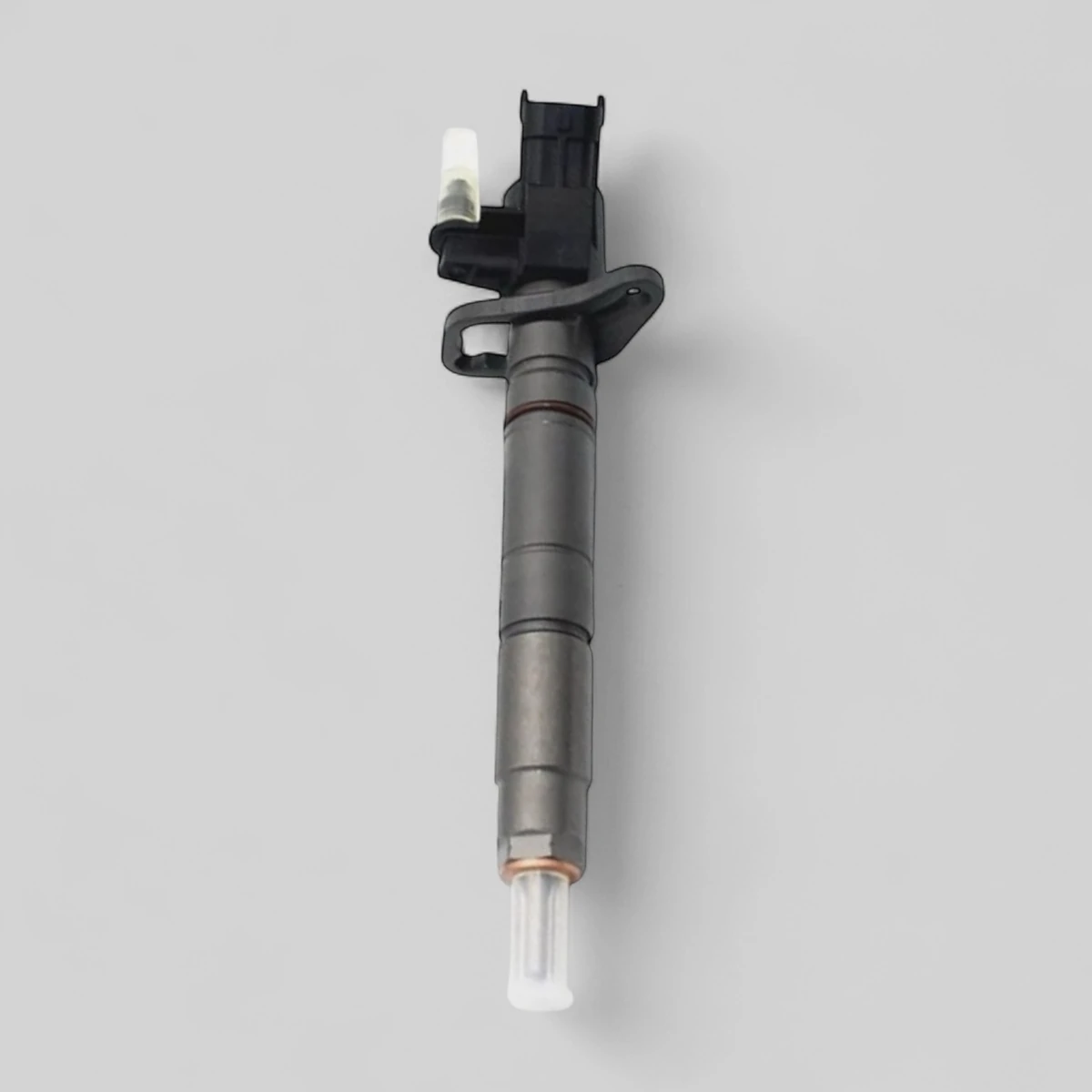 Remanufactured Bosch 0445116064 diesel injector — standing side view