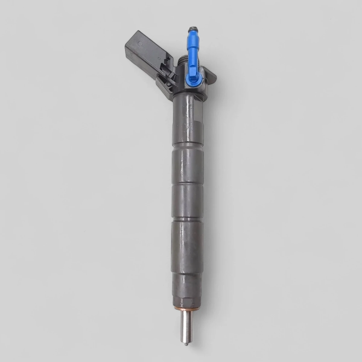 Remanufactured Bosch 0445117047 Mercedes-Benz OM654 2.0 CDI diesel injector standing side view