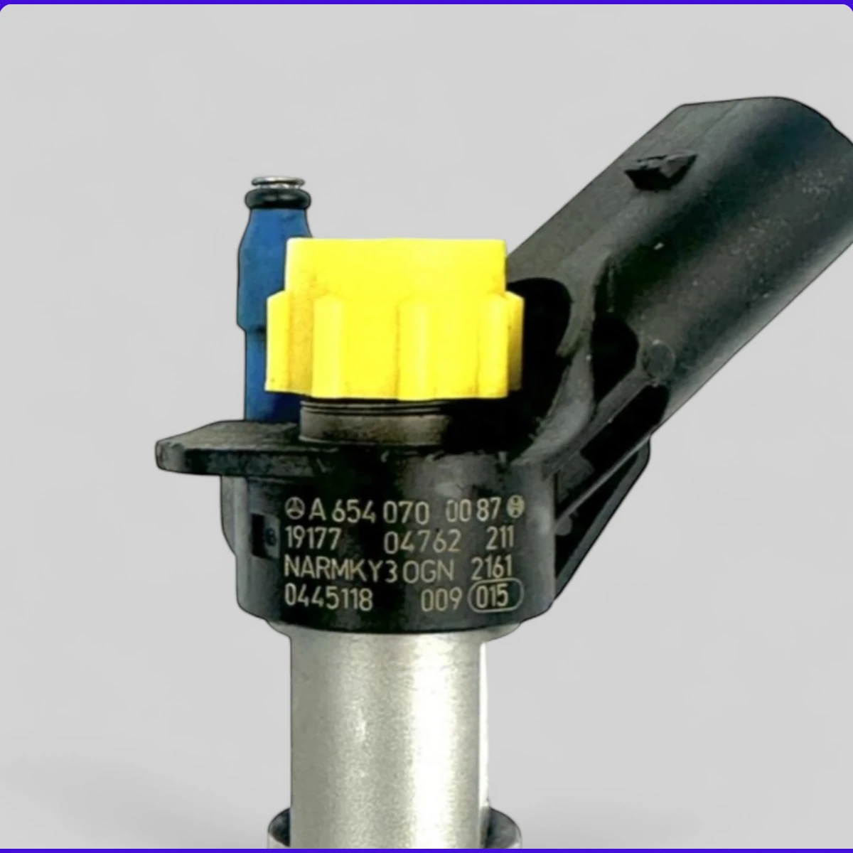 Close-up of Bosch 0445118009 part number marking with Mercedes OE A6540700087