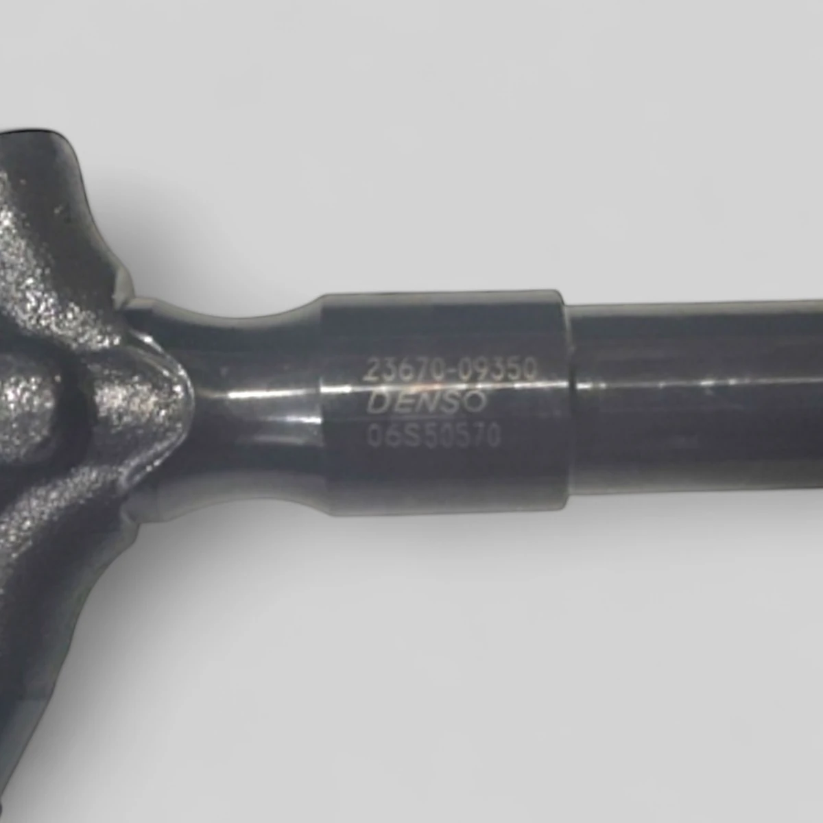 Remanufactured Denso 23670-09350 diesel injector — part number close-up