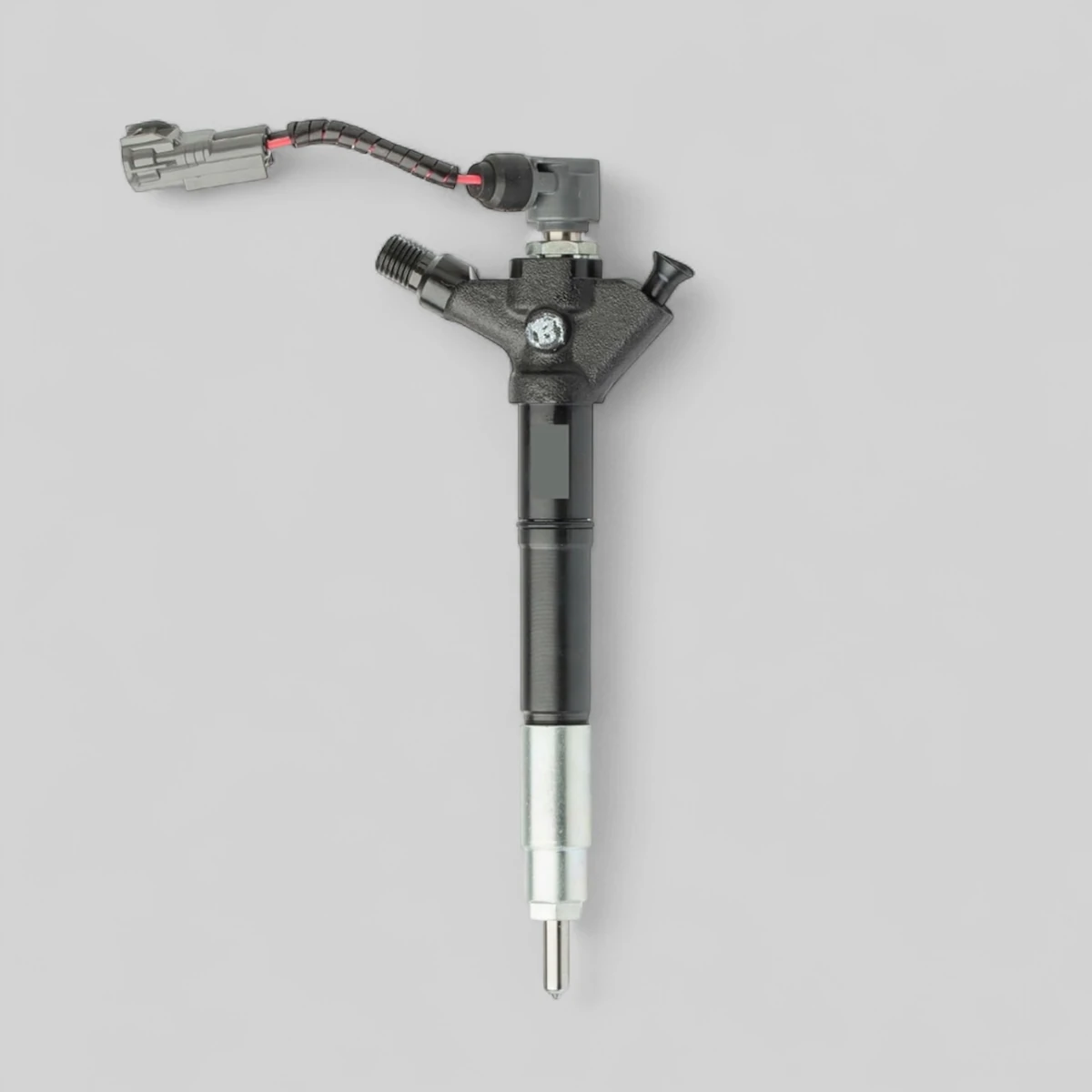 Remanufactured Denso 23670-26011 diesel injector — standing side view