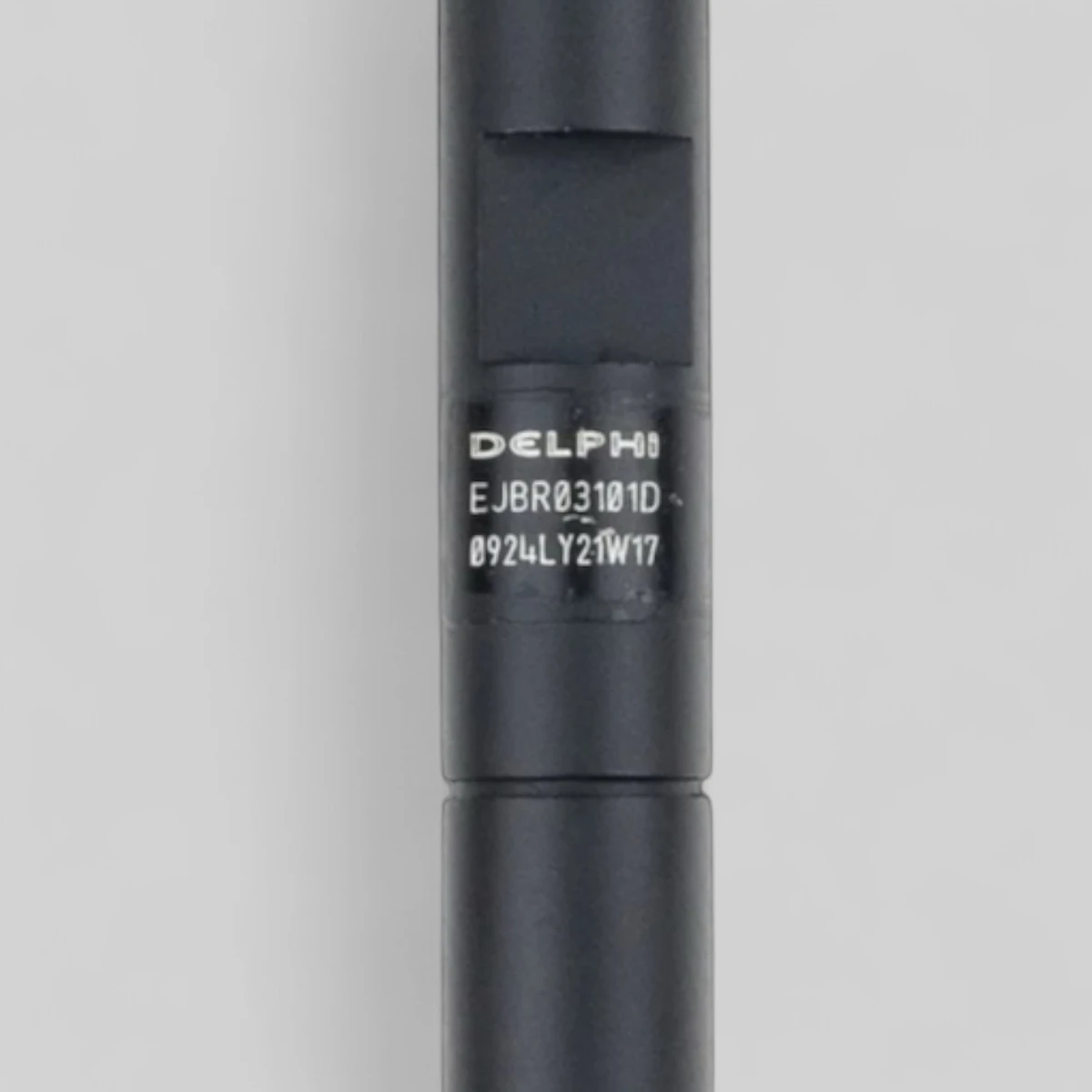 Remanufactured Delphi 28232251 diesel injector — standing side view