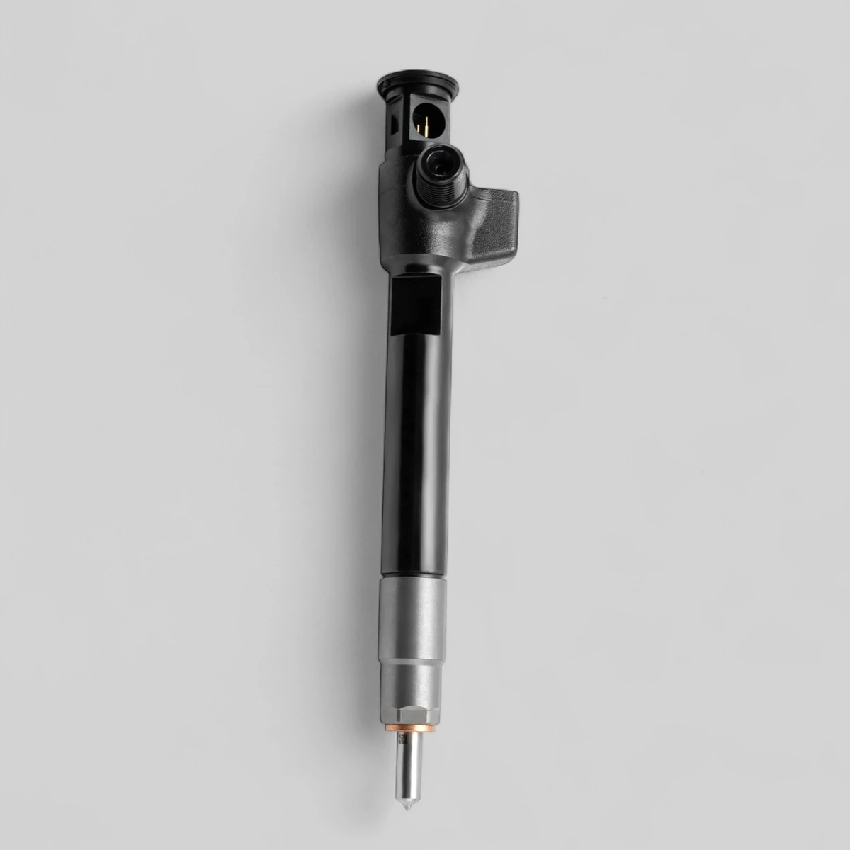Remanufactured Delphi 28388960 diesel injector — standing side view