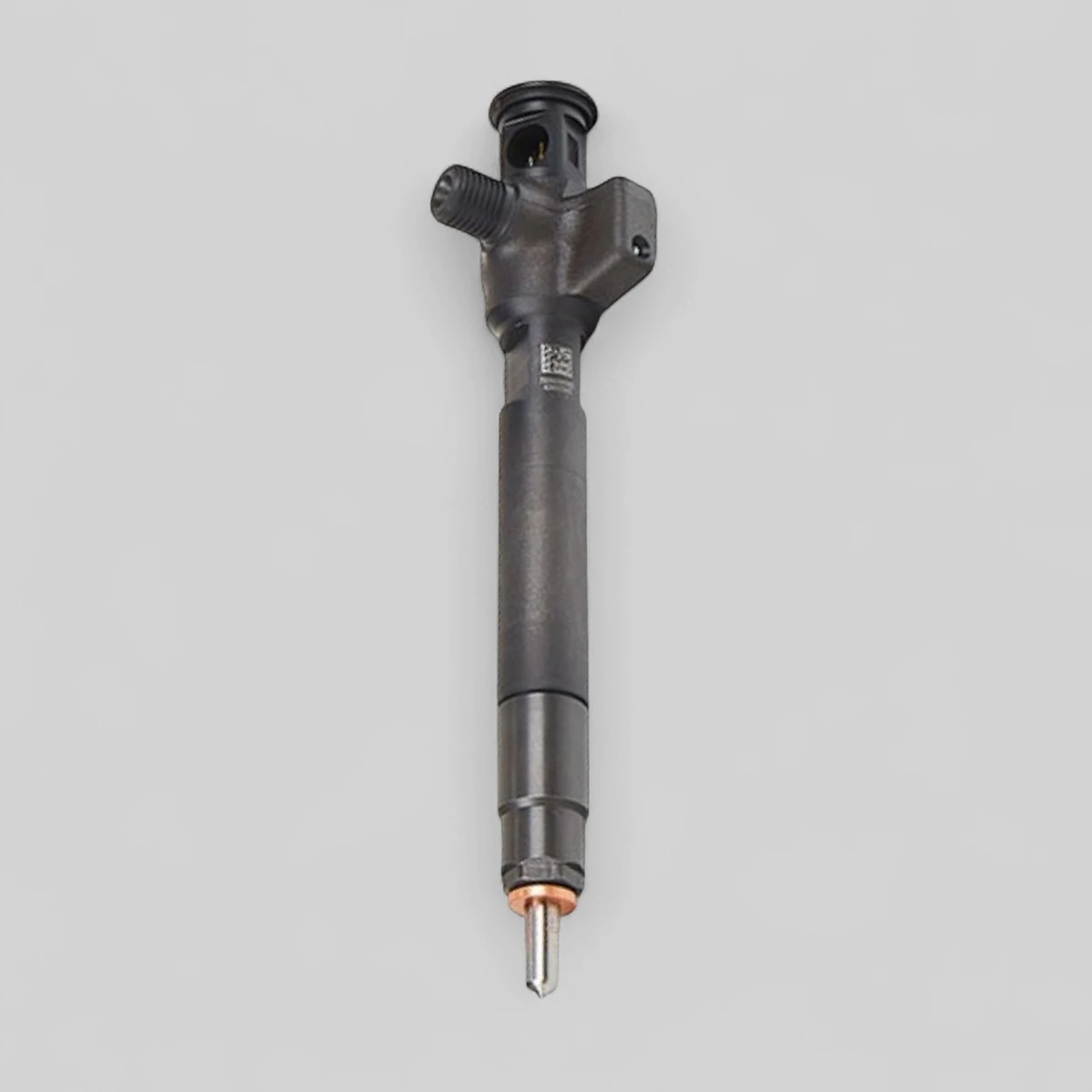 Remanufactured Delphi 28657626 diesel injector — standing side view