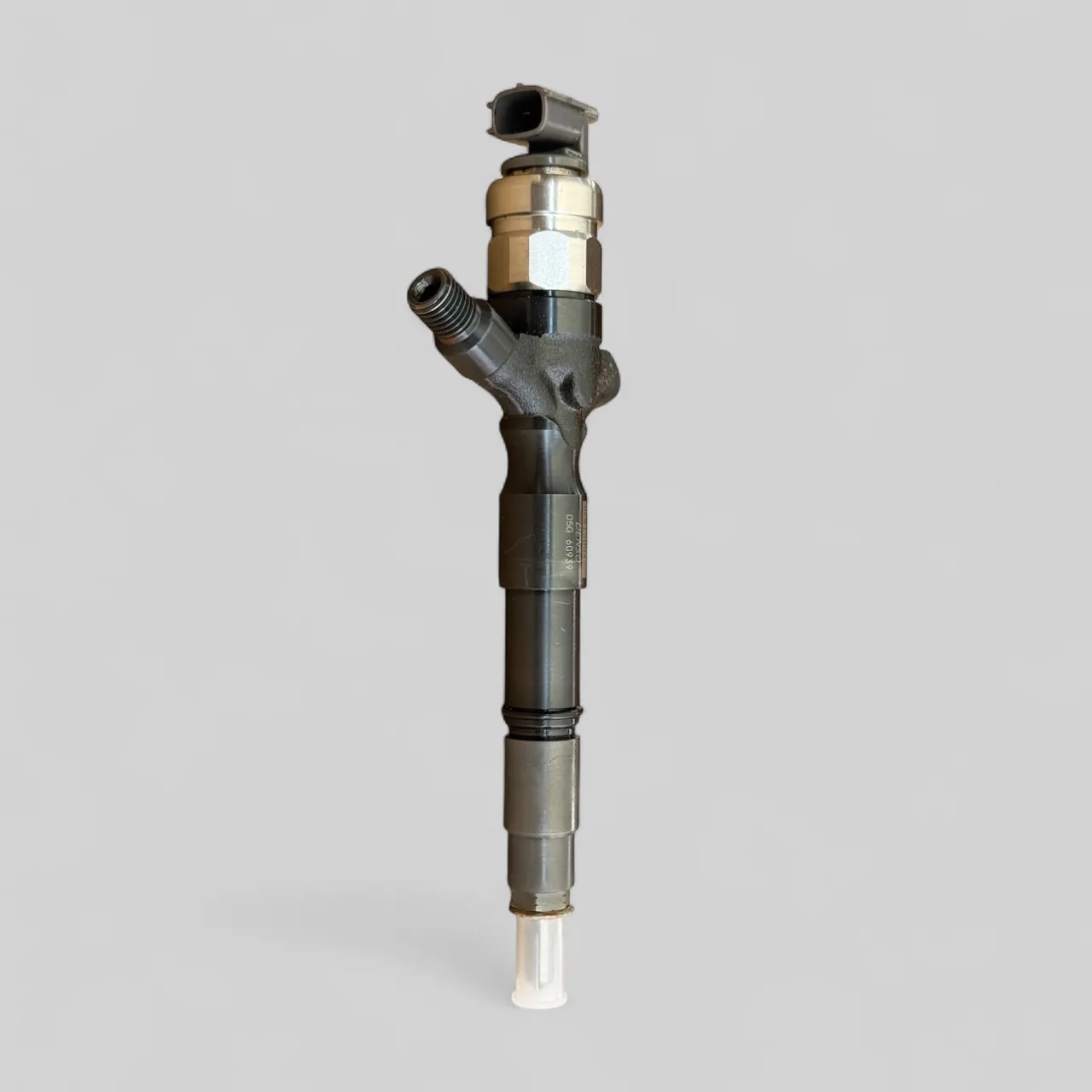 DENSO DCRI105600 diesel injector standing — side profile