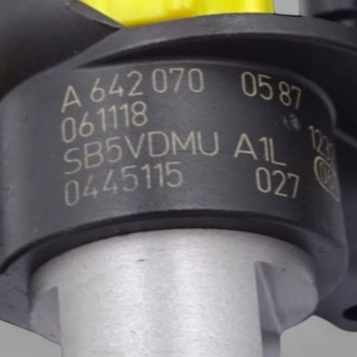 Remanufactured Bosch A6420700587 diesel injector — part number close-up