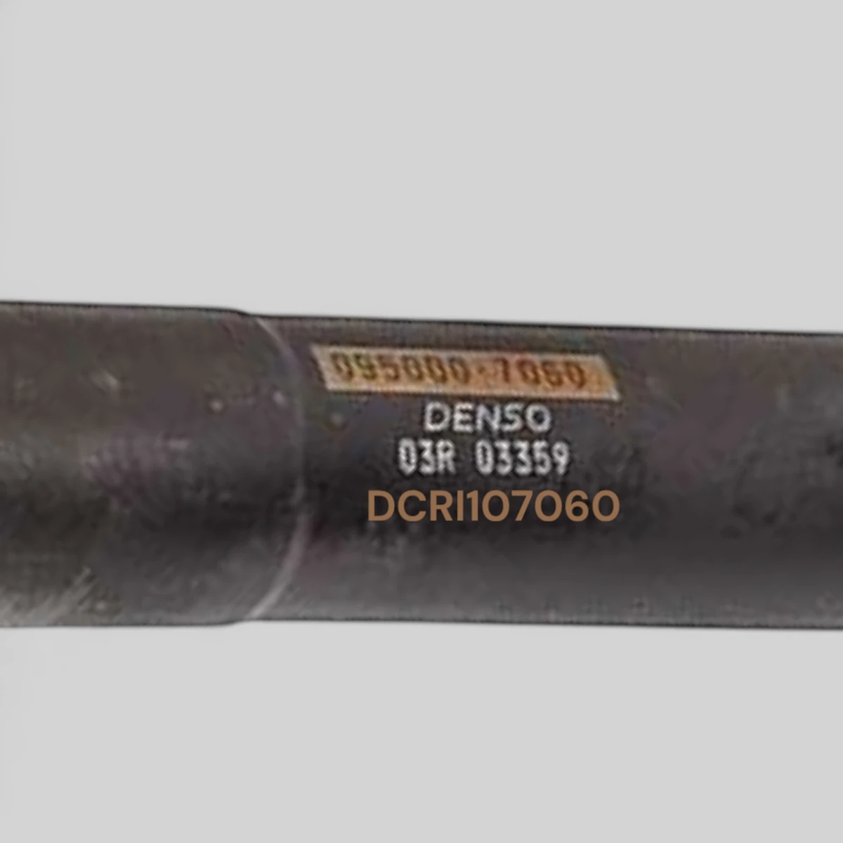 Remanufactured Denso DCRI107060 diesel injector — part number close-up