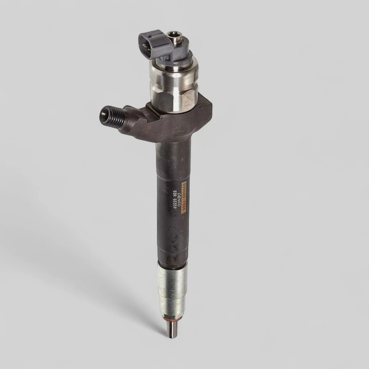 Remanufactured Denso DCRI107060 diesel injector — standing side view