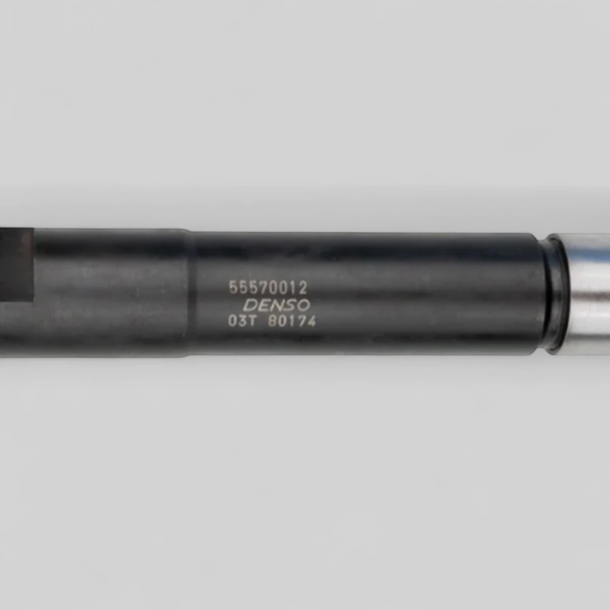 Denso DCRI300770 diesel injector part-number close-up showing 55570012