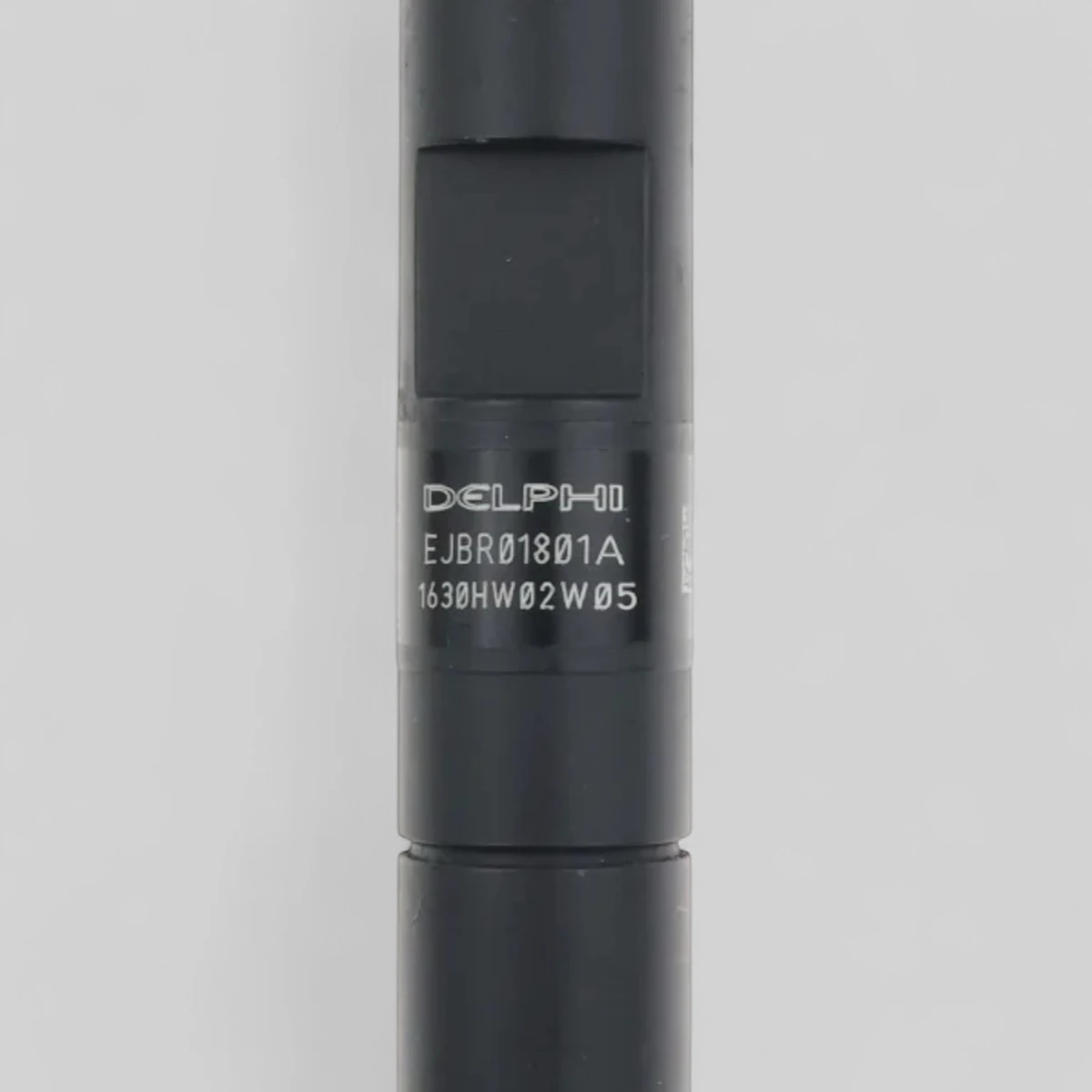 Remanufactured Delphi EJBR01801A diesel injector — part number close-up
