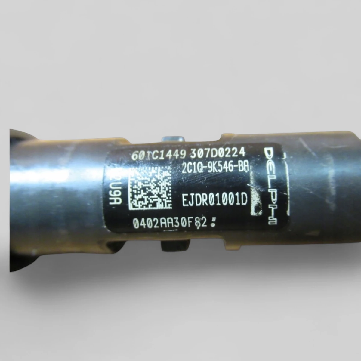 Remanufactured Delphi EJDR01001D diesel injector — part number close-up
